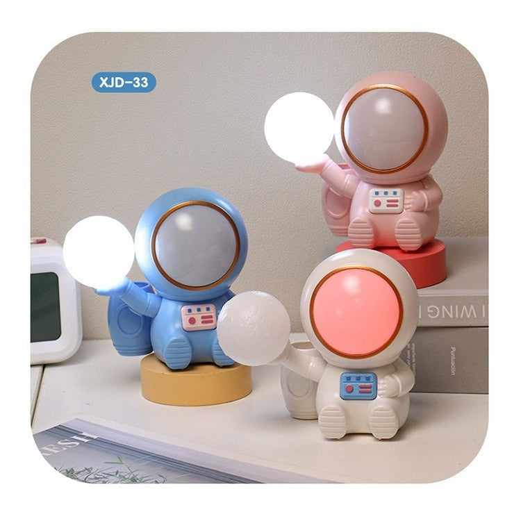 Lampa de Veghe 2in1, Lampa, Ascutitoare si Spatiu Depozitare, Model Astronaut, Incarcare USB, din ABS, 12 x 7 x 11 cm, Lumina Led, Multicolor