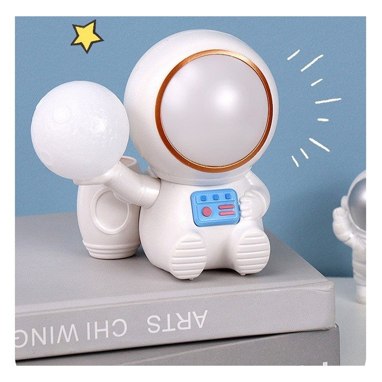 Lampa de Veghe 2in1, Lampa, Ascutitoare si Spatiu Depozitare, Model Astronaut, Incarcare USB, din ABS, 12 x 7 x 11 cm, Lumina Led, Multicolor