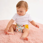 Set 4 scutece ecologice Happy Flute cu imprimeu curcubeu + 12 insertii/absorbante din microfibra 3-15kg